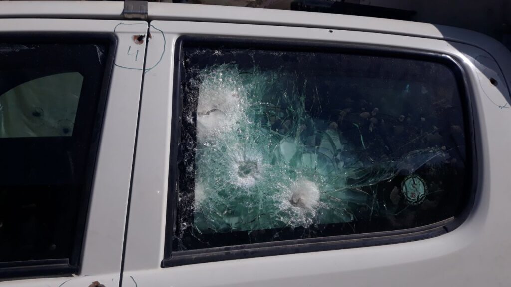 AK-47 Shots on Armoured Toyota Hilux Bulletproof Rera Door Glass Provided by Dynamic Defense Solutions, Zero Penetration, all passengers were saved.