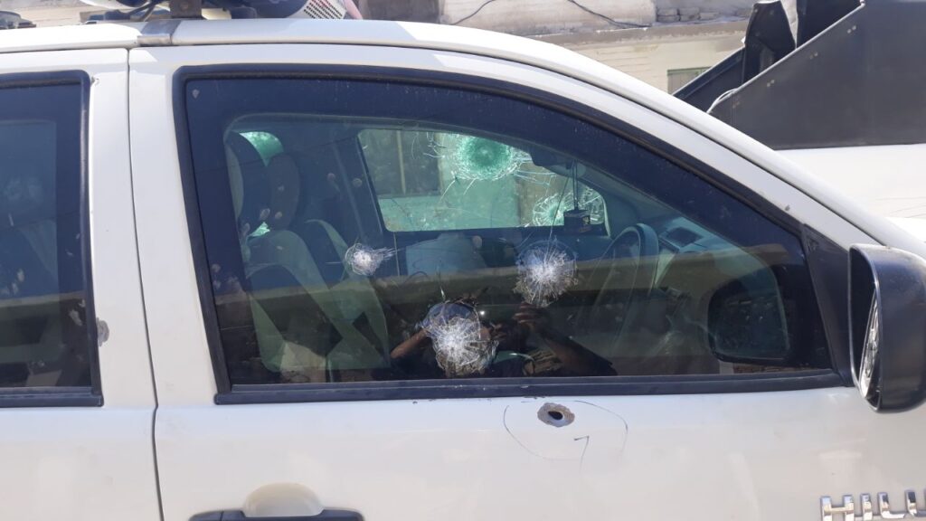 Gun fire on Armoured Toyota Hilux Bulletproof Glass Front Left Door Provided by Dynamic Defense Solutions, Zero Penetration, all passengers were saved.